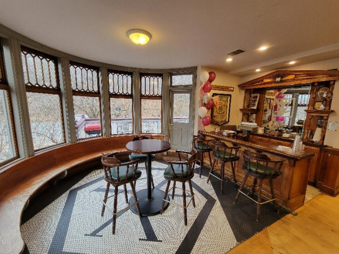 Image 18 - (AFTER) The Round Room and bar area.