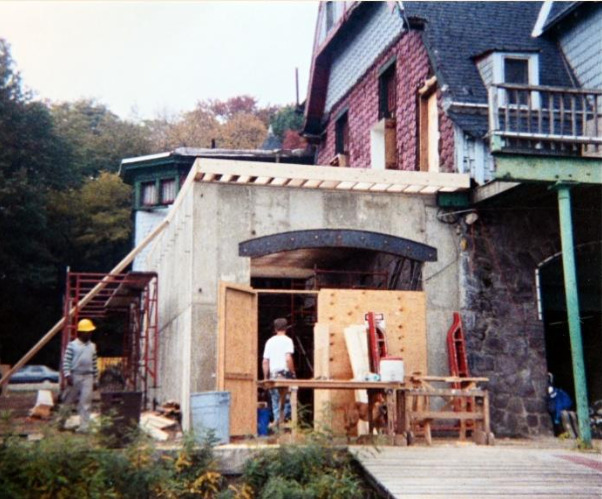 Image 13 - New concrete poured walls and arched steel lintel that will also support two floors above. i.e. men’s showers at the third floor and ladies’ lockers at the second